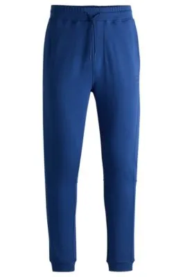 Cotton-terry tracksuit bottoms with logo patch