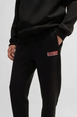 Cotton-terry tracksuit bottoms with logo print