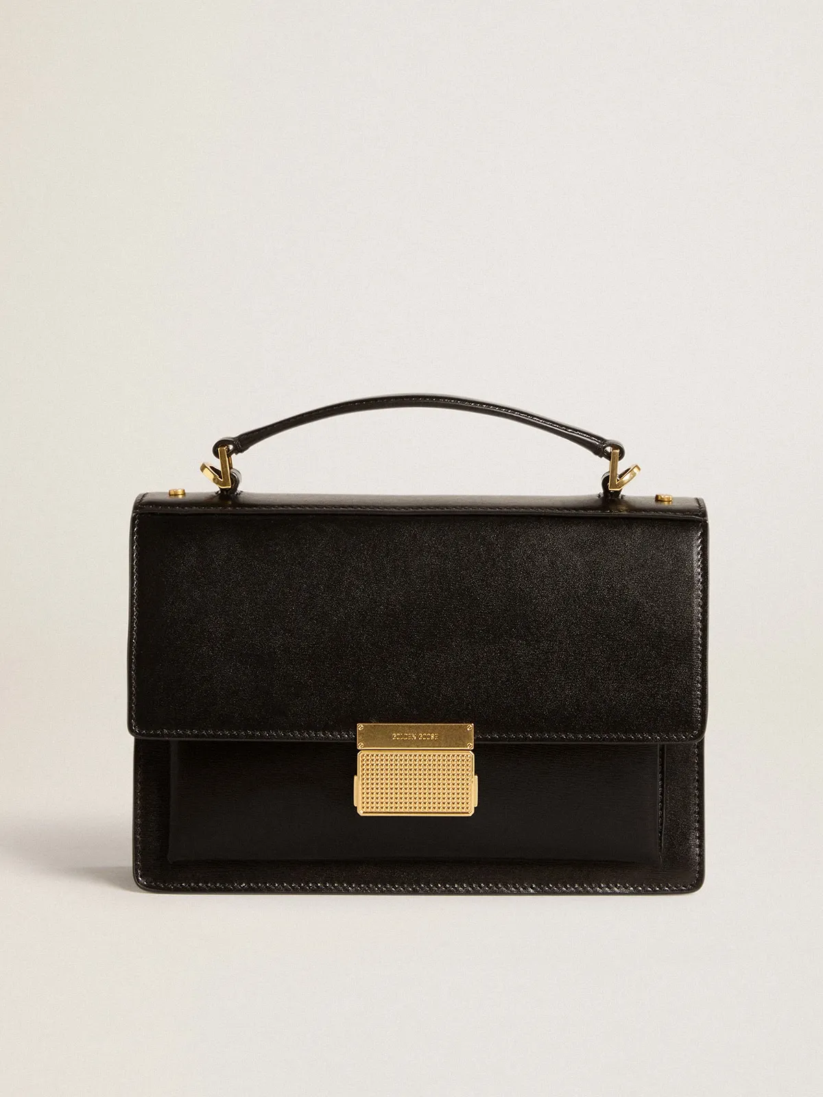 Venezia Bag in black boarded leather with gold details